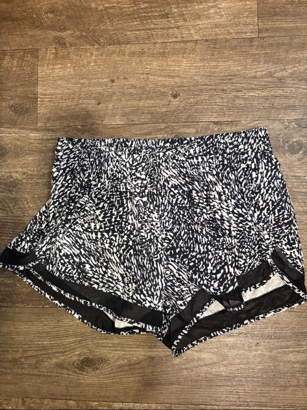 Athleta black and white mesh racer run 4in Athletic Shorts medium